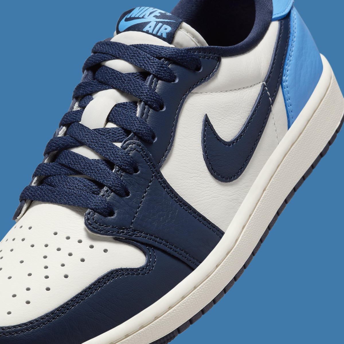Jordan 1 Low OG Obsidian UNC - Vista 7