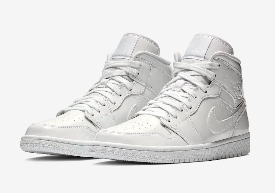 Jordan 1 Mid Triple White Patent Swoosh (Women's) - Vista 1